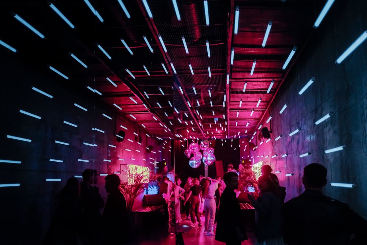 Dancers under neon light