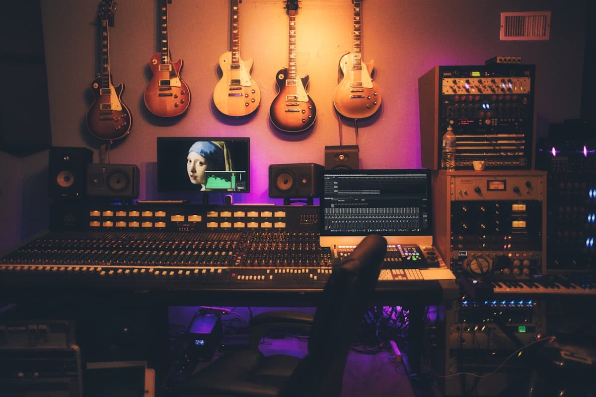 A music studio wall of guitars